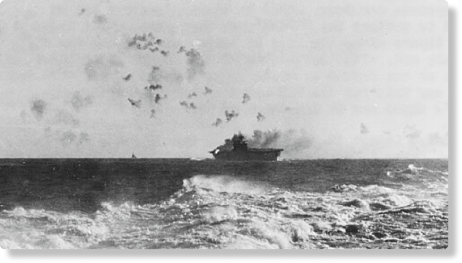 USS  Enterprise manobrando radicalmente sob ataque aéreo e em chamas em 24